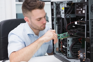 computer engineer fixing computer problem computer engineer fixing computer problem